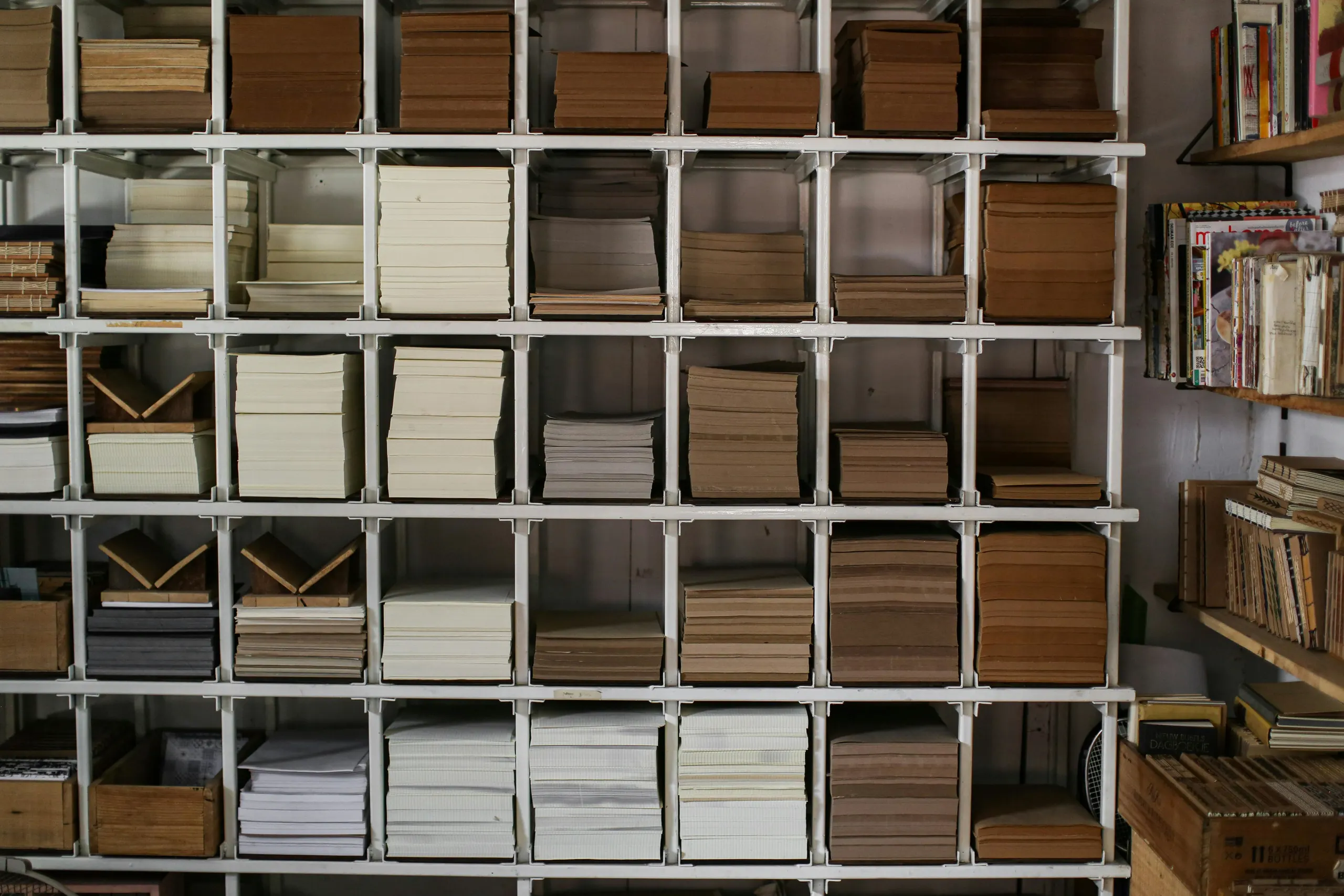 Stacks of papers on shelves